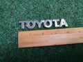 TOYOTA 04-08 Solara 09-11 Matrix Rear Trunk Lid Hatch Emblem OEM 75447-AA040 4S4