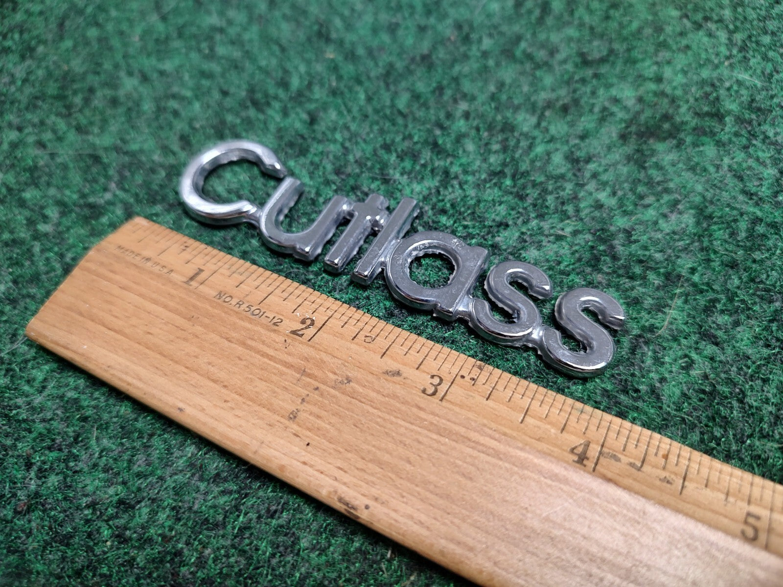 Oldsmobile Cutlass Emblem Nameplate Chrome Metal OEM 1S2
