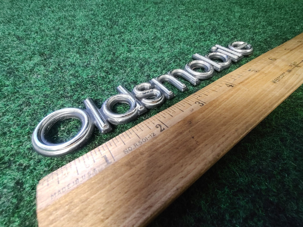 Oldsmobile OEM Chrome Emblem Badge Logo Nameplate Name Plate 8L2