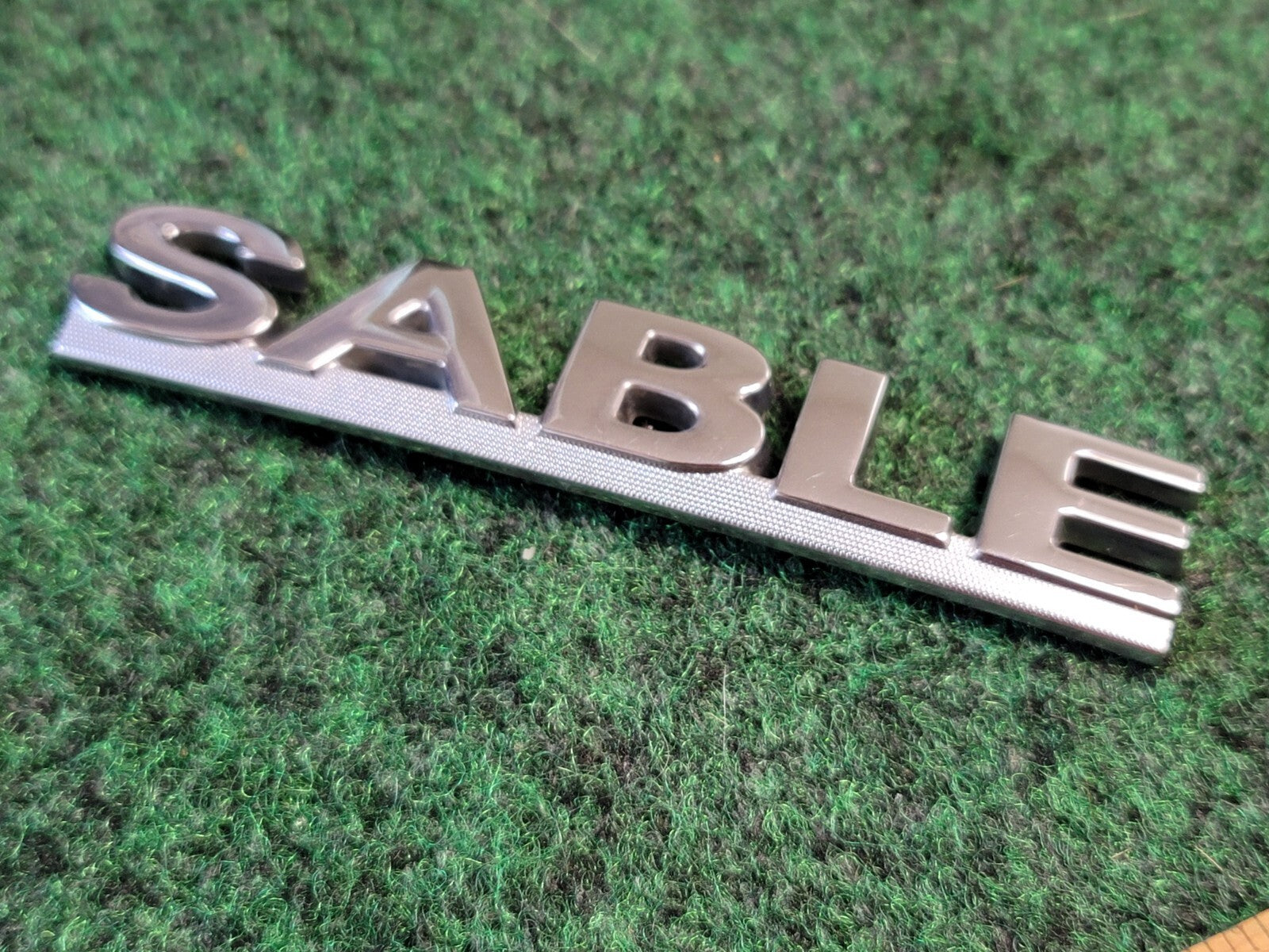 00 01 02 03 MERCURY SABLE REAR GATE LID EMBLEM BADGE SYMBOL LOGO OEM 4S8