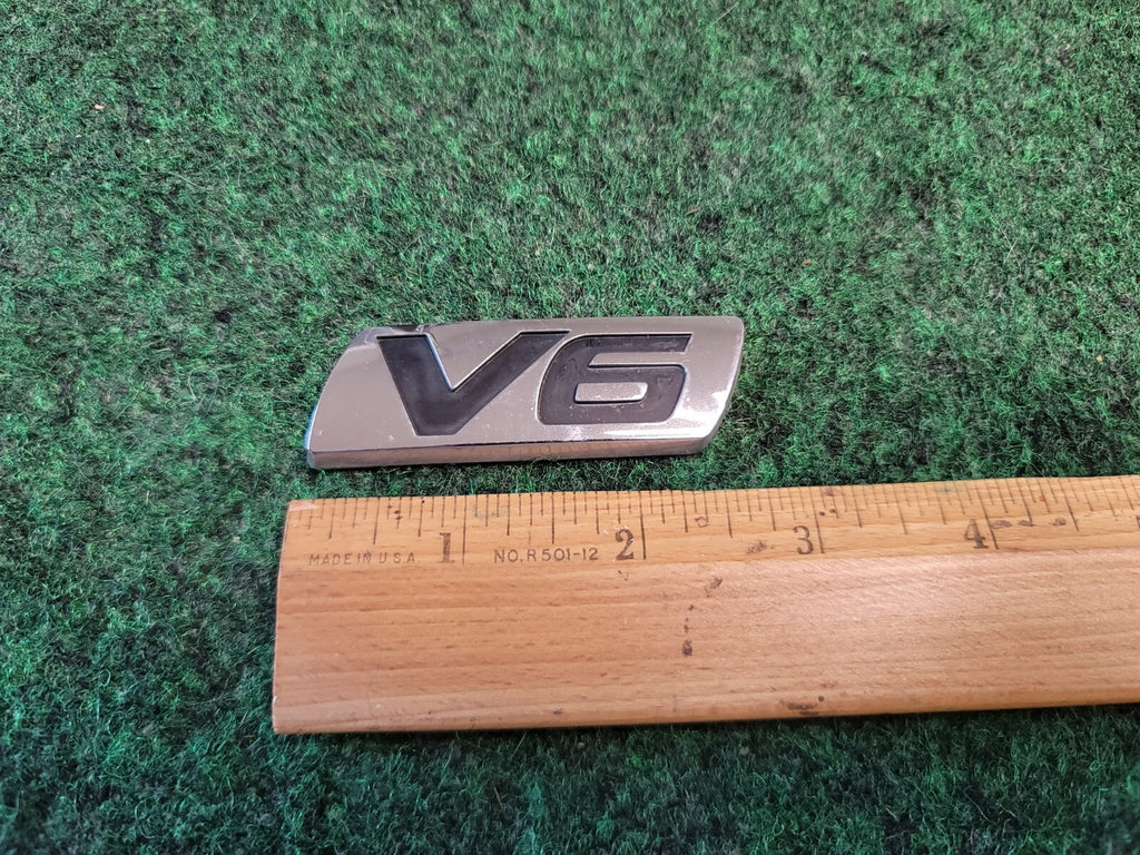 1998-2007 HONDA ACCORD V6 REAR EMBLEM BADGE SYMBOL OEM 7L1