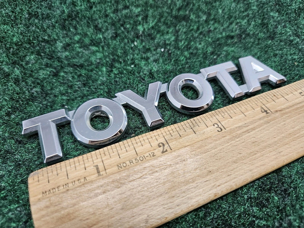 Genuine OEM Toyota 75442-16530 "TOYOTA" Trunk Emblem Badge Nameplate GL2
