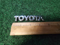 00-03 Toyota ECHO Rear Trunk Script Emblem Badge Nameplate OEM 75446-52020 8L2