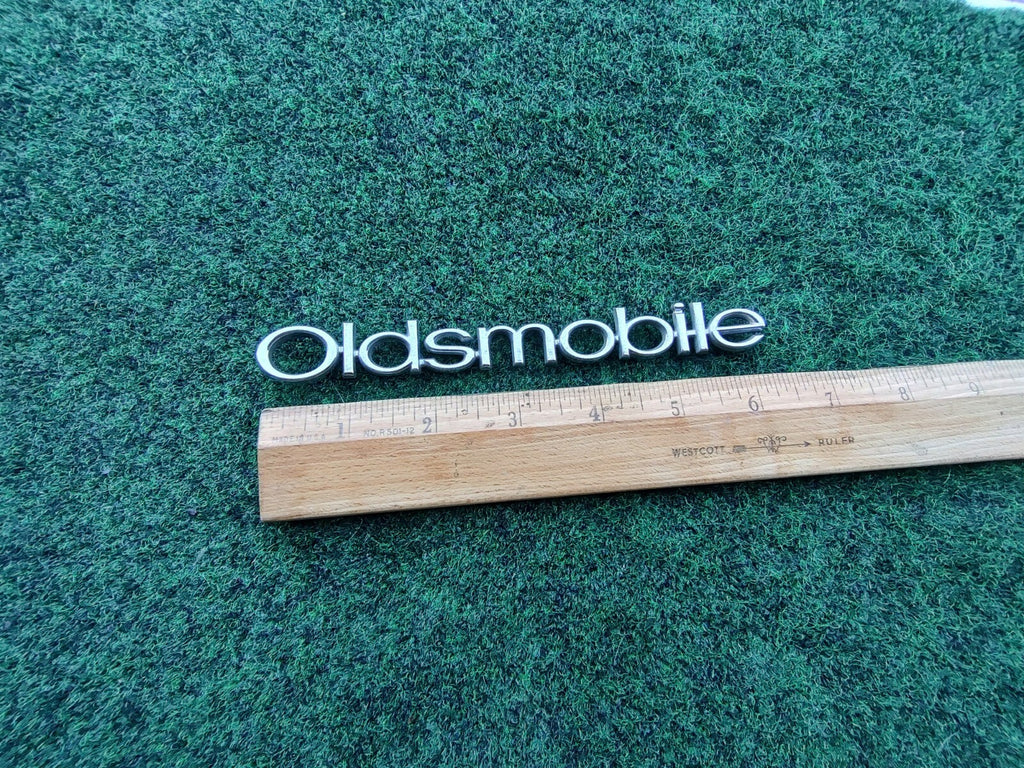 Oldsmobile OEM Chrome Emblem Badge Logo Nameplate Name Plate 10L4