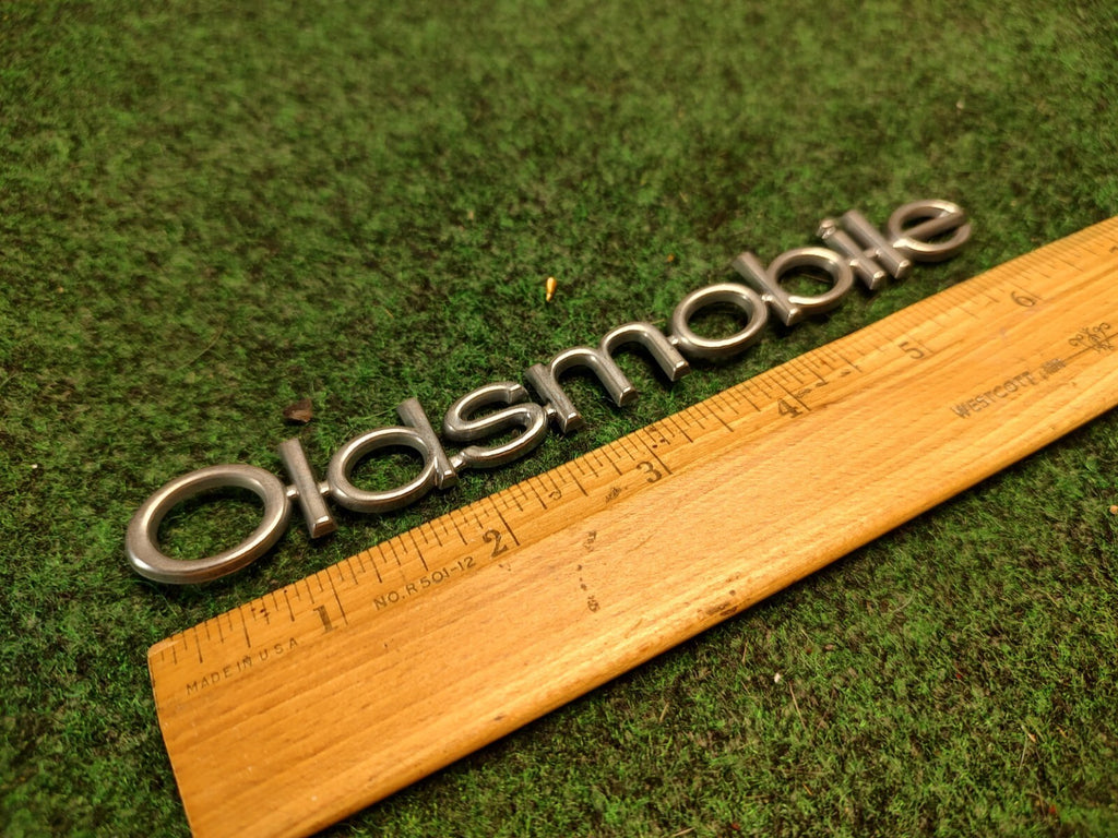 Oldsmobile OEM Chrome Emblem Badge Logo Nameplate Name Plate 2S3