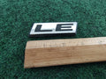 1984-1992 DODGE CARAVAN PLYMOUTH VOYAGER LE REAR LID EMBLEM LOGO BADGE OEM 5S5