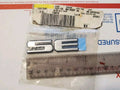 22657237 OEM GM EMBLEM PLATE BADGE SE FRONT DOOR 1999-2002 Pontiac GRAND AM 3L7