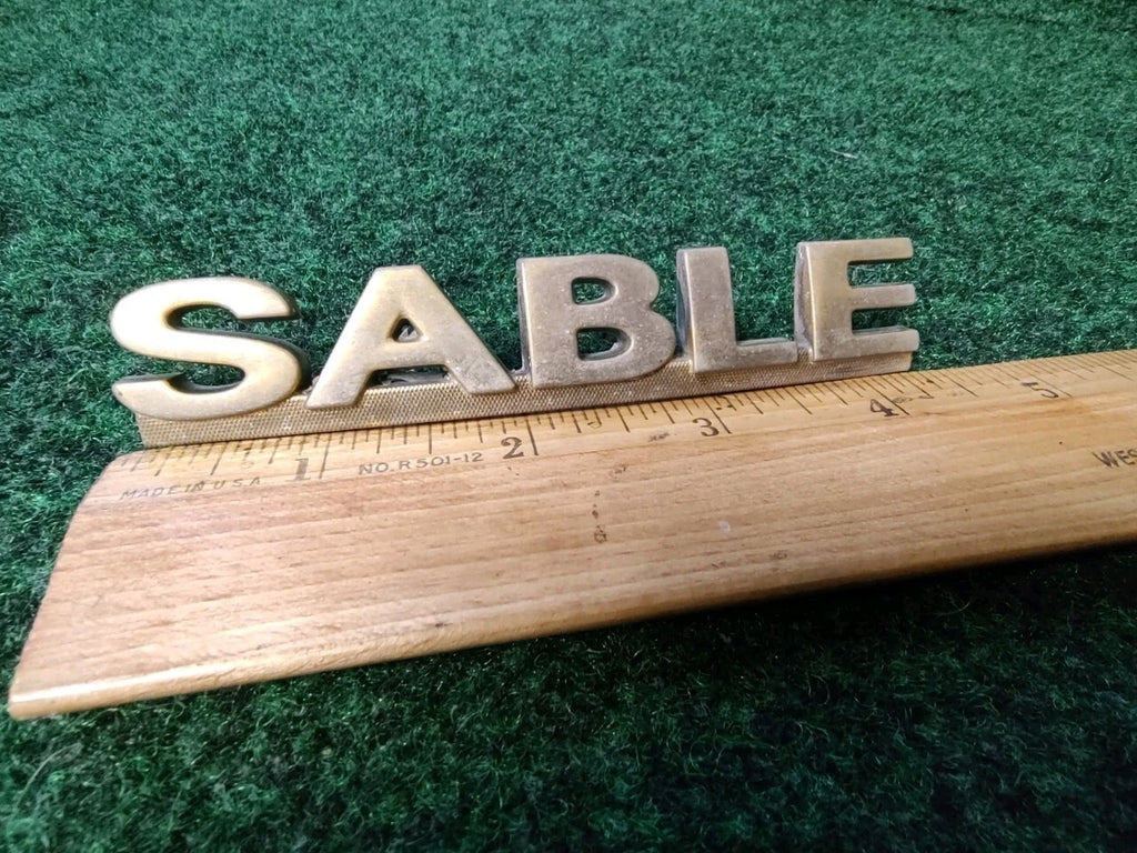 00 01 02 03 MERCURY SABLE REAR GATE LID EMBLEM BADGE SYMBOL LOGO OEM 5S6