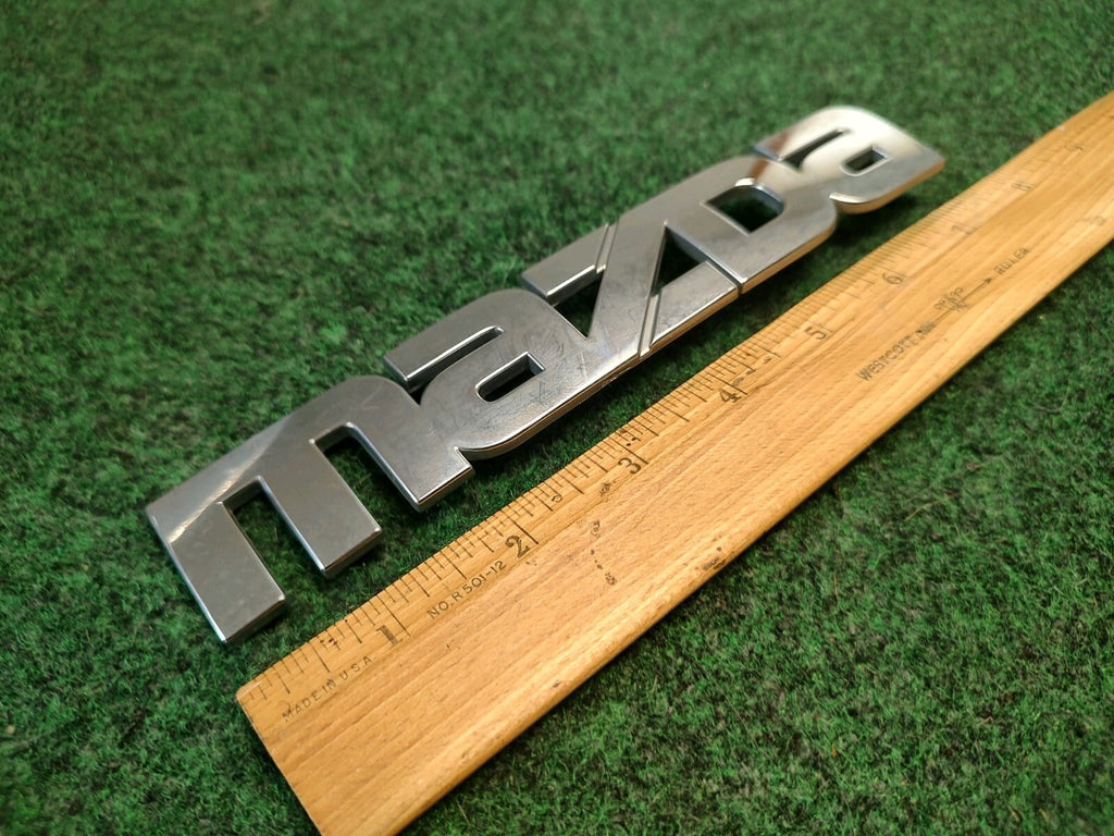 Mazda 2000-2006 MPV Rear Tailgate Emblem Badge Logo Nameplate LC63 51 710 1S7