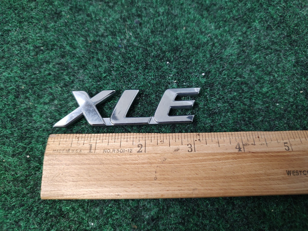 OEM Toyota Sienna (1998-2020) XLE Rear Emblem Chrome 75443-08030 1M4