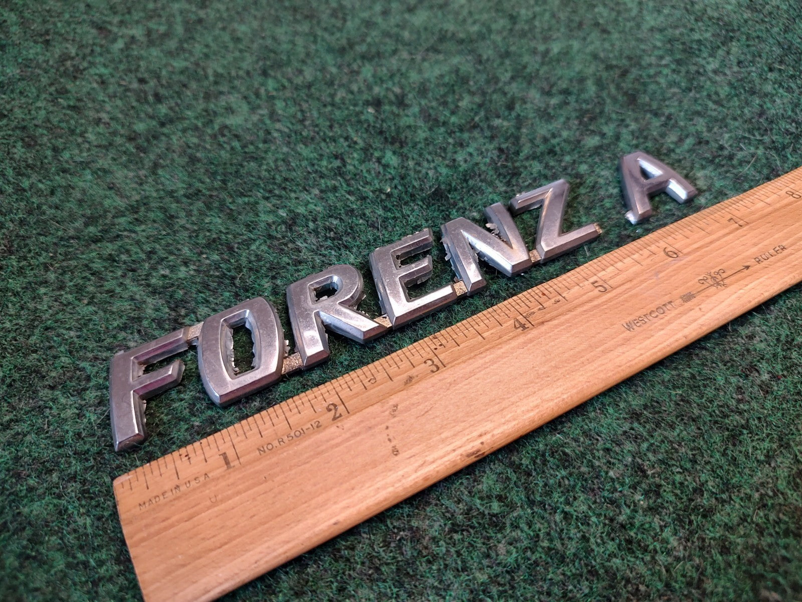 04 05 06 - 08 Suzuki Forenza Emblem Nameplate Rear Trunk Lift Gate Hatch OEM 3S1