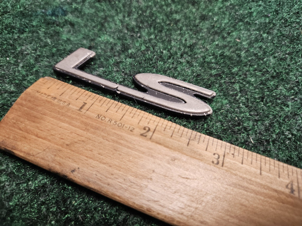 1997-2003 Chevrolet Malibu "LS" Plastic Silver Emblem - USED -  22638474 5M8