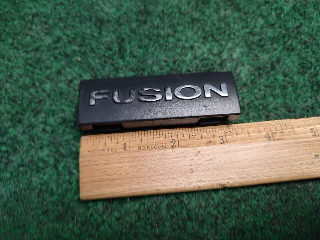 2006-2009 FORD FUSION DASH EMBLEM LOGO BADGE SYMBOL USED OEM 3S3