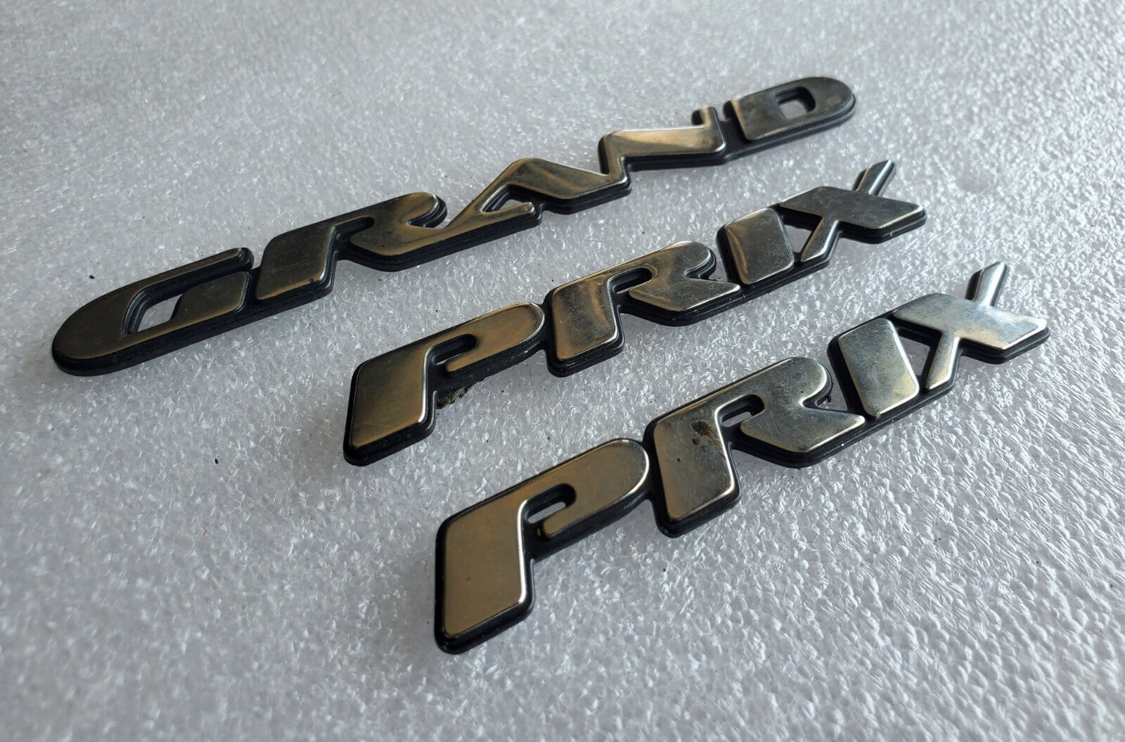 1997 1998 1999 2003 Pontiac Grand Prix Door Name Plate Chrome NAMEPLATE OEM VNTG