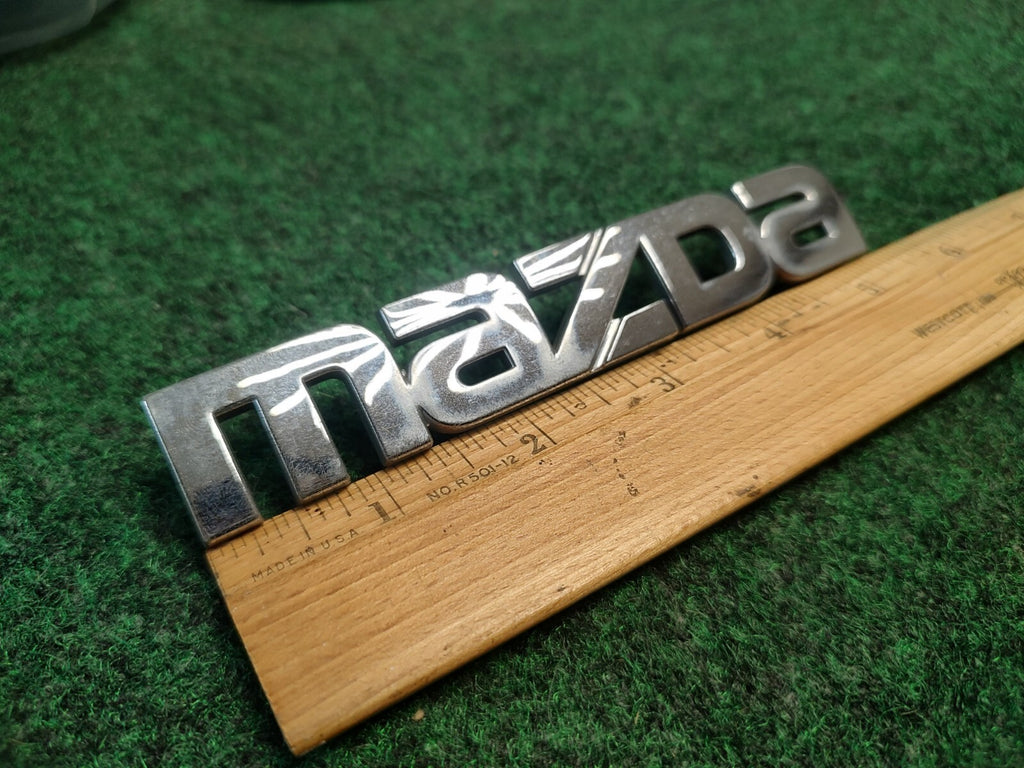1999 00 2001 2002 2003 Mazda Protege Rear Trunk Nameplate Emblem B25D-51-710 1S9
