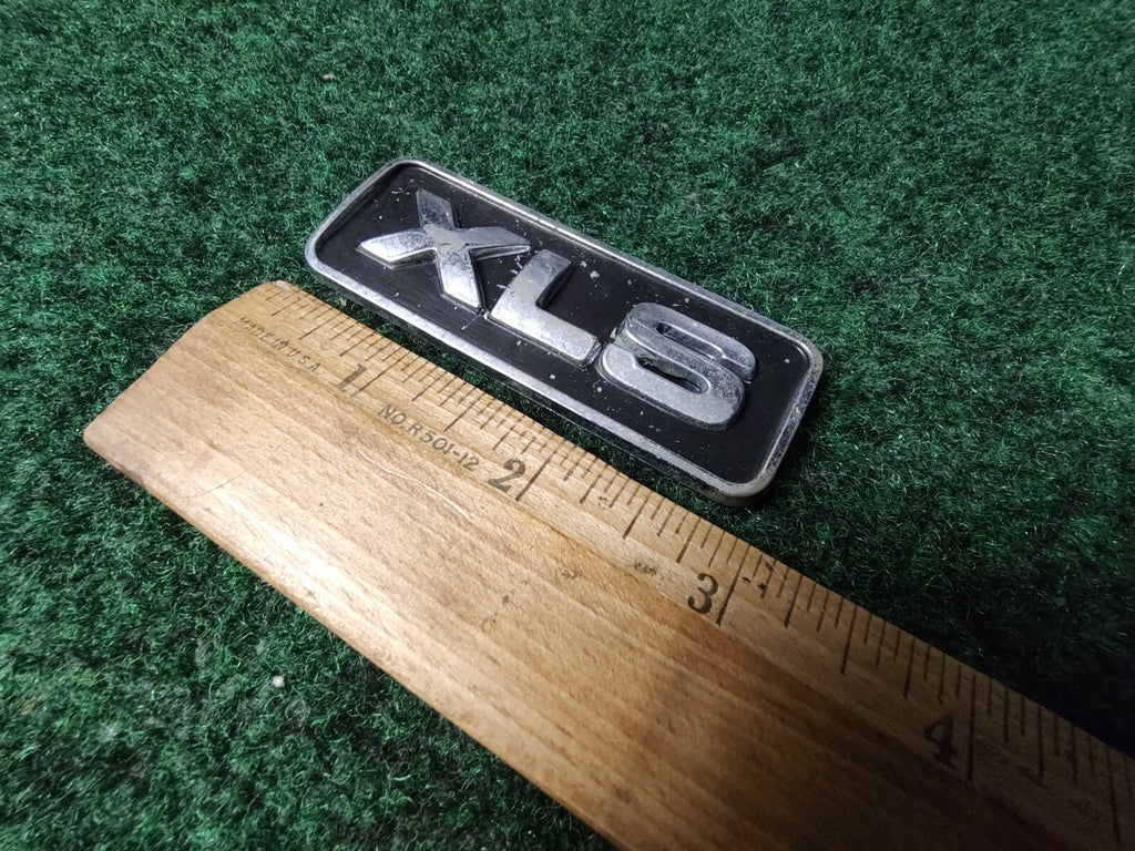 Ford OEM XLS Black & Chrome Plastic Emblem Badge Logo Nameplate Name Plate 6L5