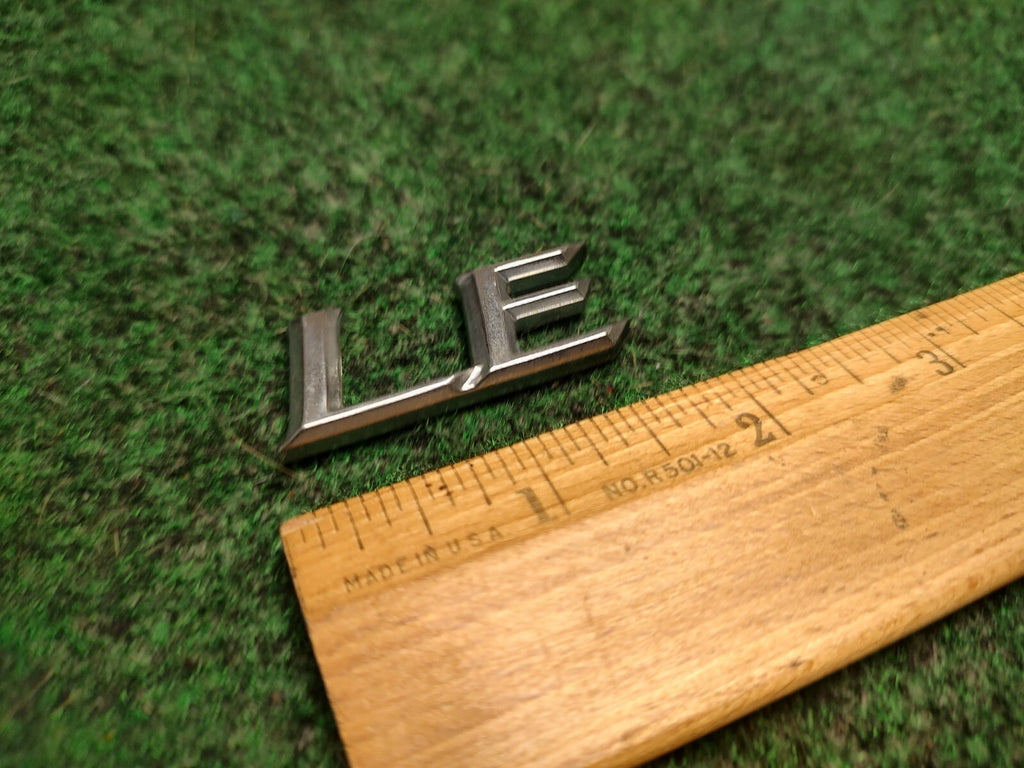 Genuine Toyota Camry "LE" Emblem USED 2002-2006  Rear 75443-AA100 3S5