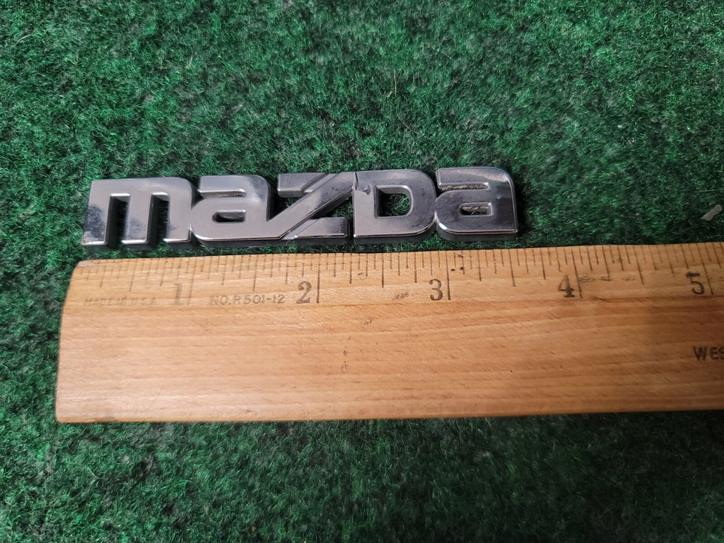 99-05 MAZDA MIATA MX5 MX-5 REAR EMBLEM LOGO BADGE SYMBOL 1999-2005 5S2