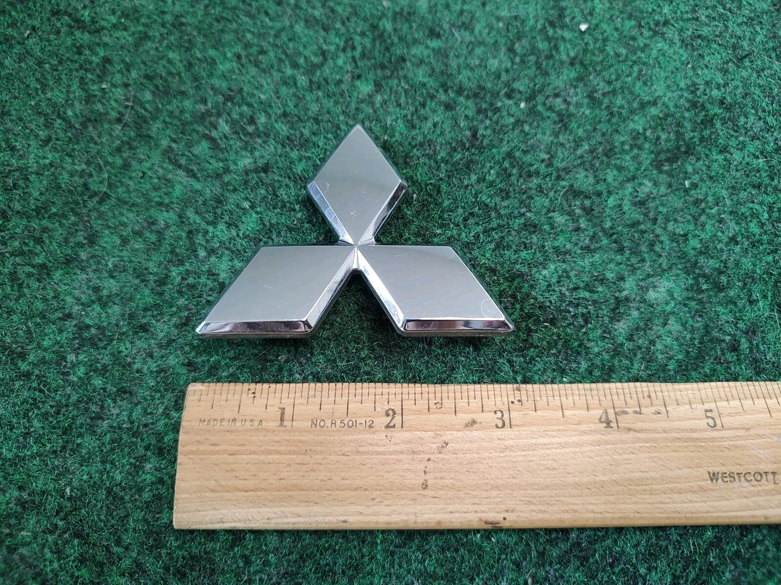 2002-2005 Mitsubishi Eclipse Rear Trunk Emblem Logo Nameplate MR971390 OEM 1S5