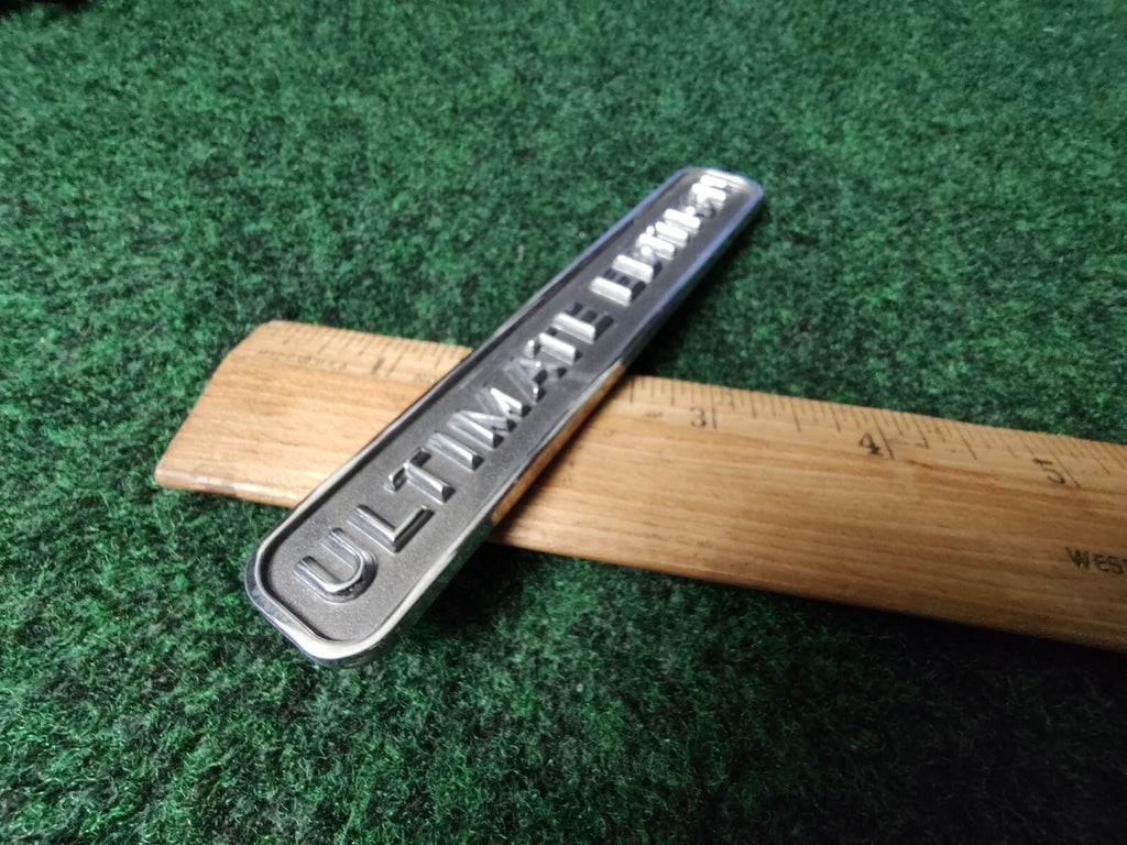 2003-2011 MERCURY GRAND MARQUIS ULTIMATE EDITION EMBLEM BADGE SYMBOL OEM 7S1