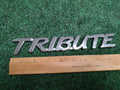Mazda 2001-2006 Tribute Rear Tailgate Emblem Badge Logo Nameplate Name Plate 1S2