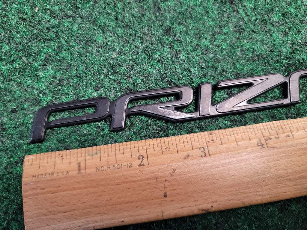 Chevy PRIZM Emblem Badge Nameplate Plastic Chrome Script 75443-1A680 1M7