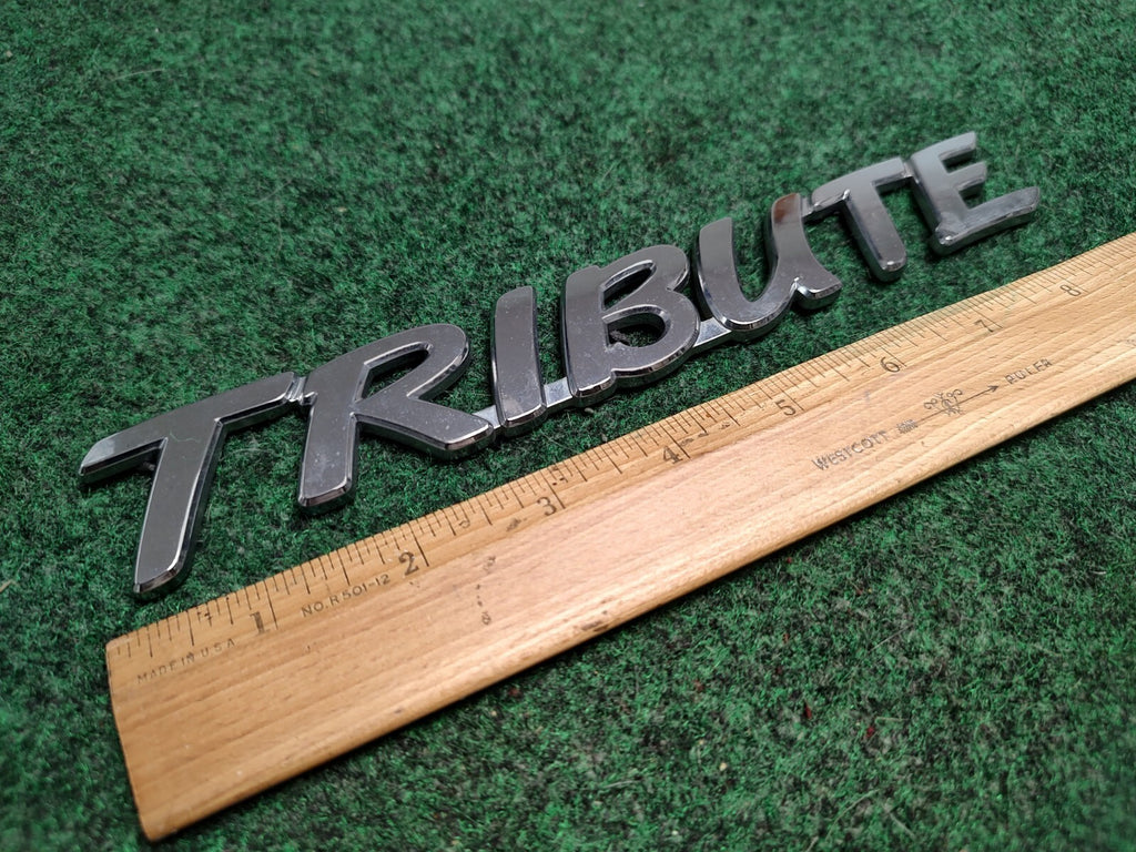 Mazda 2001-2006 Tribute Rear Tailgate Emblem Badge Logo Nameplate Name Plate 1S2