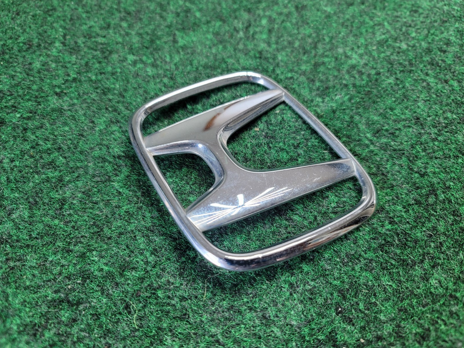 2005-2010 HONDA ODYSSEY REAR LIFTGATE EMBLEM LOGO SYMBOL 75701-SHJ-A000 OEM 1M1