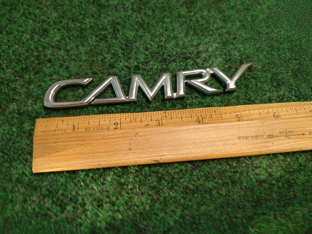 2002-2006 TOYOTA CAMRY CHROME REAR EMBLEM LOGO BADGE NAME PLATE OEM 3S8