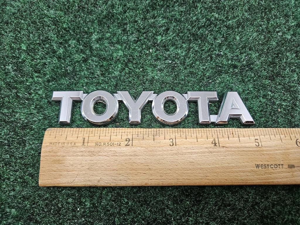 Genuine OEM Toyota 75442-16530 "TOYOTA" Trunk Emblem Badge Nameplate GL2