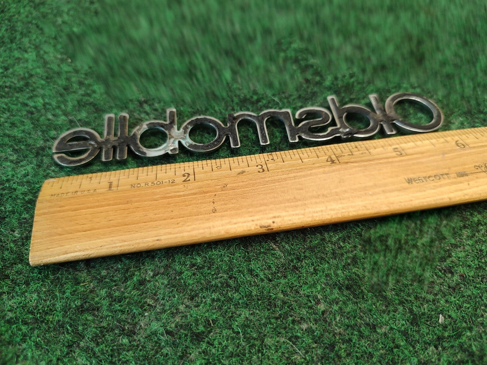 Oldsmobile Cutlass Supreme NOS GM Rear Nameplate Emblem Chrome 16502255 4S7