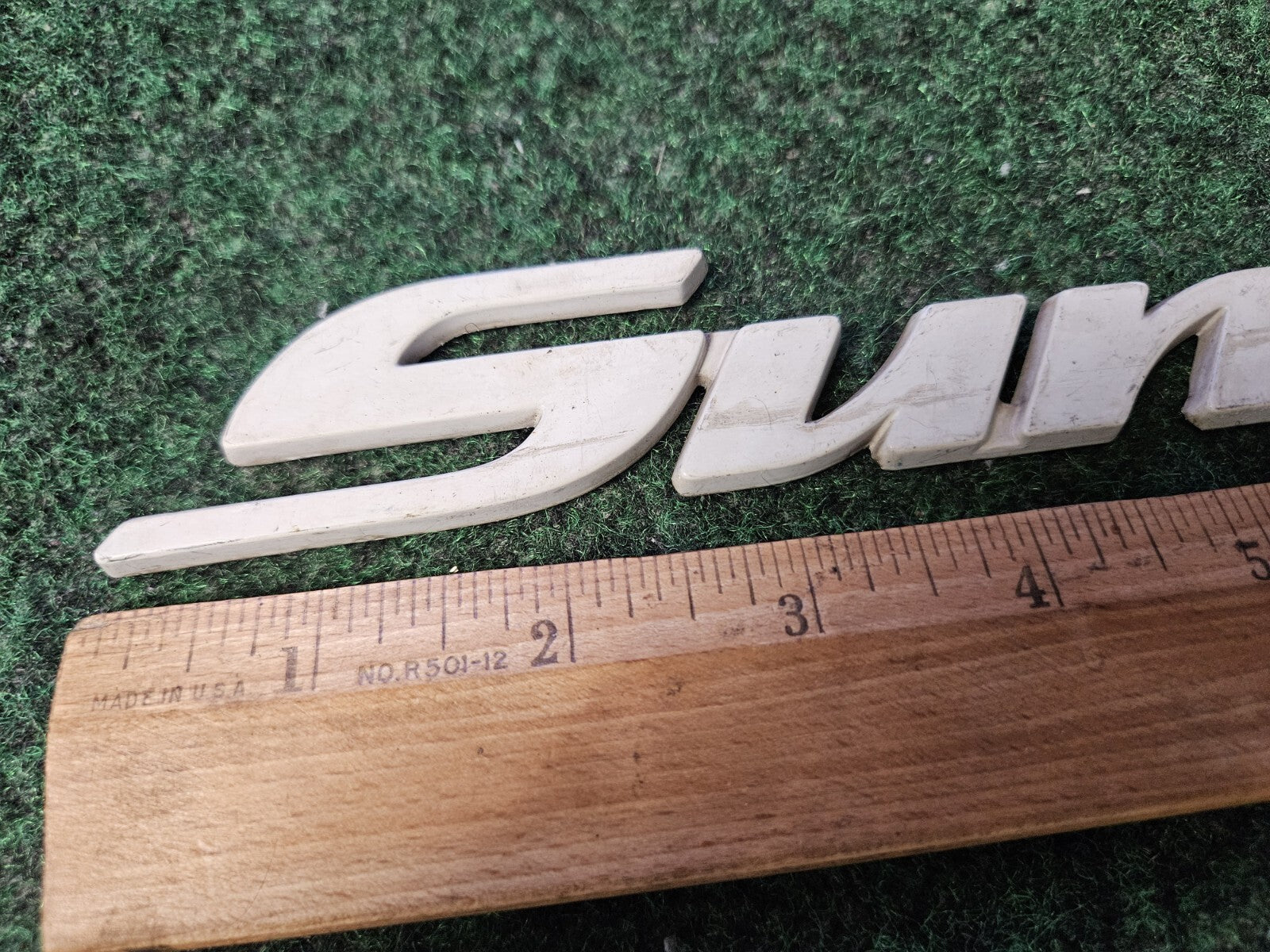 1998-2004 Pontiac Sunfire Emblem Badge Logo Nameplate Name Plate White 4M9