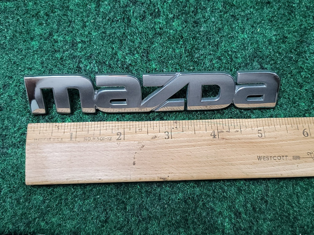 1999 00 2001 2002 2003 Mazda Protege Rear Trunk Nameplate Emblem B25D-51-710 1M1