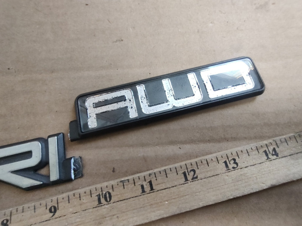 1996-2004 GMC Safari AWD Decal Logo Badge Name Plate Emblem Cracked DL1
