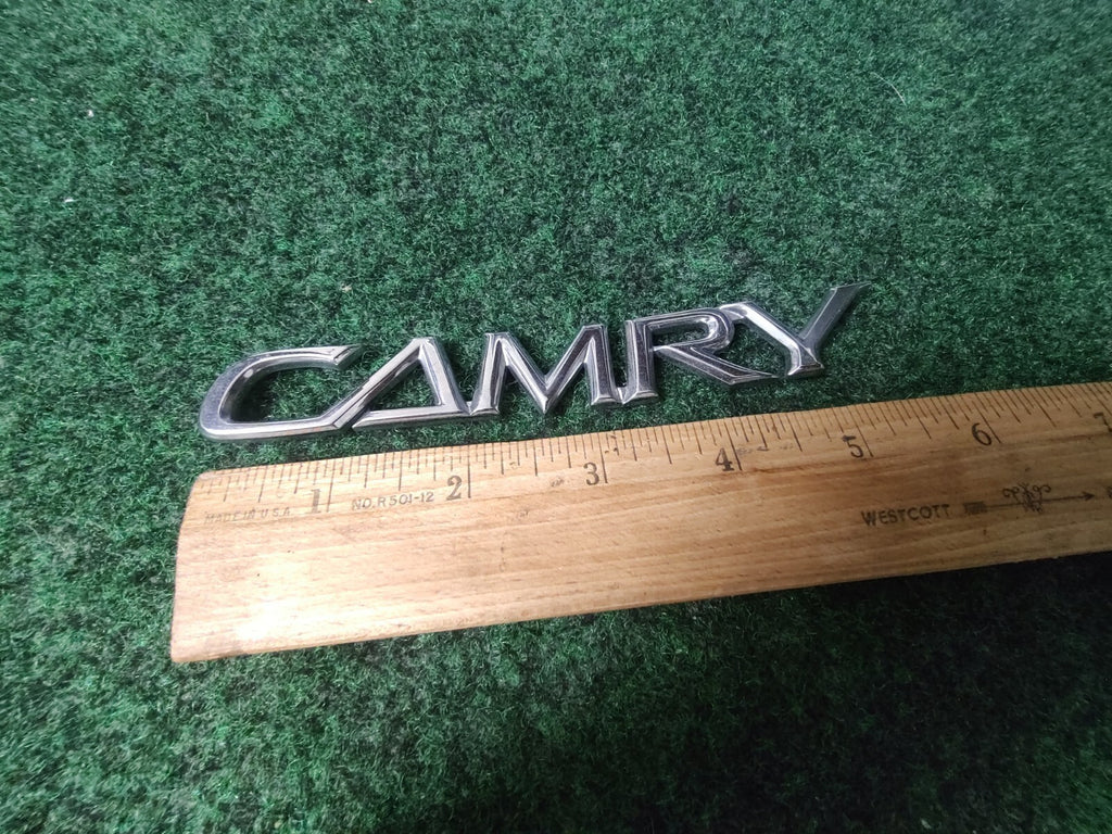 2002-2006 TOYOTA CAMRY CHROME REAR EMBLEM LOGO BADGE NAME PLATE OEM 8L3