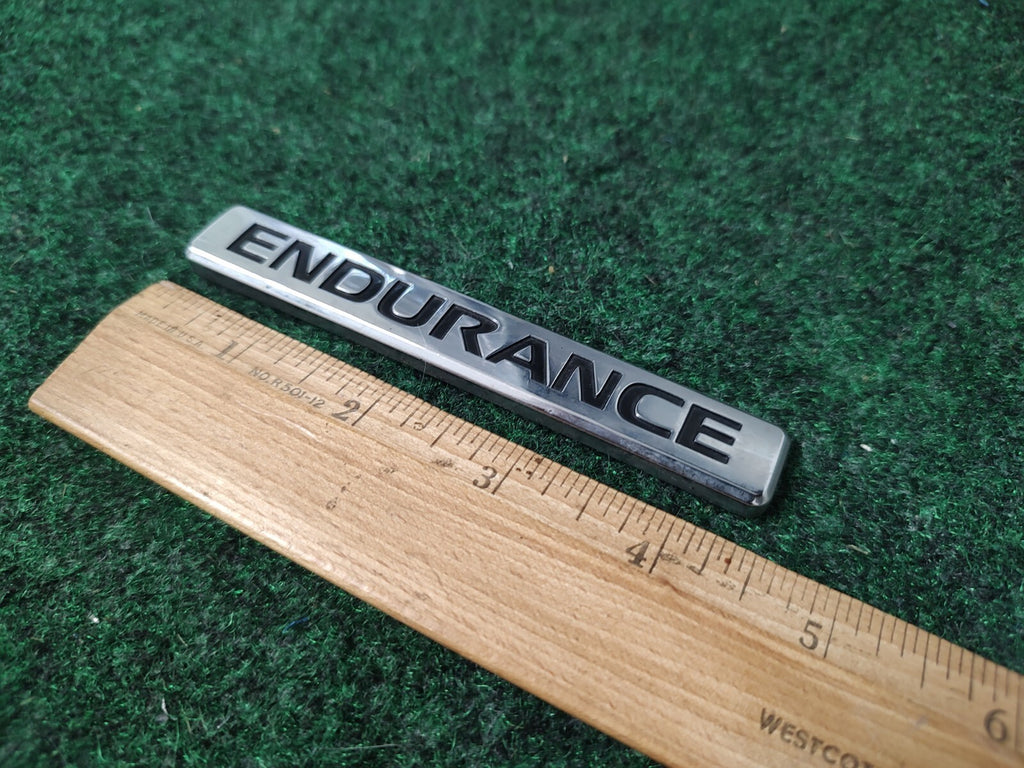 Nissan Endurance Emblem Badge Decal Logo Titan Armada OEM Factory Genuine 1M4