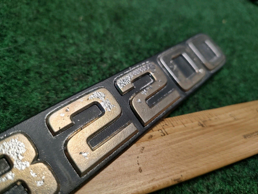1986-1993 MAZDA B2200 SIDE FENDER EMBLEM BADGE SYMBOL LOGO NAMEPLATE 2S4