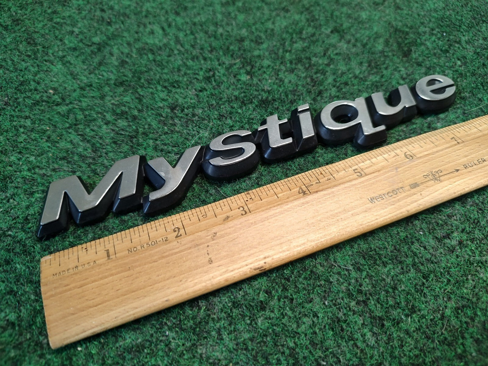95 96 97 98 99 00 MERCURY MYSTIQUE REAR EMBLEM LOGO BADGE SIGN SYMBOL OEM 2S8