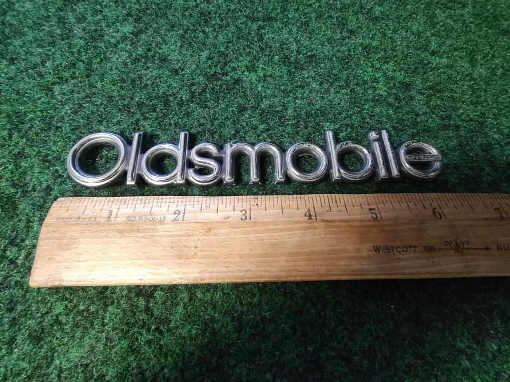 Oldsmobile OEM Chrome Emblem Badge Logo Nameplate Name Plate 8L2