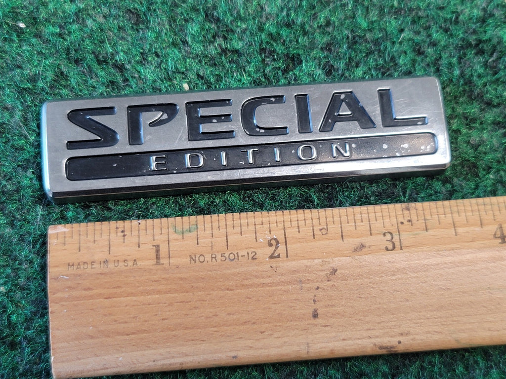 2005-2018 Nissan Altima Special Edition Nameplate Emblem  84896-ZG100 1M6