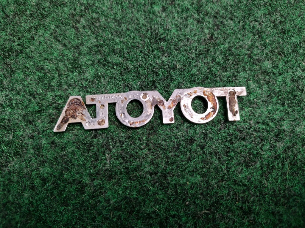Toyota OEM 1998-2002 Corolla Sedan Rear Trunk Emblem Badge Logo 75441-12770 1S6
