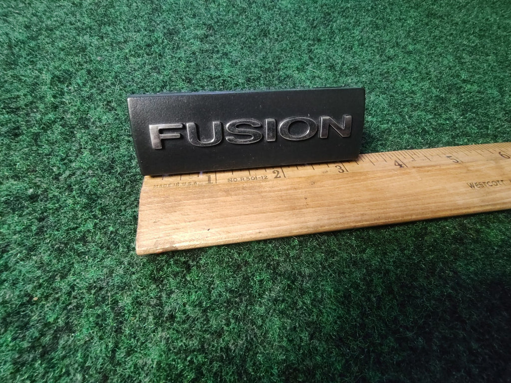 2006-2009 FORD FUSION DASH EMBLEM LOGO BADGE SYMBOL USED OEM 8L2