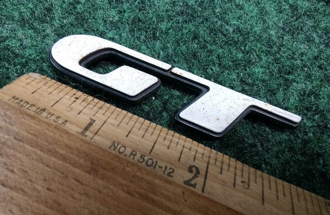PONTIAC GRAND AM PRIX GT EMBLEM LOGO BADGE SIGN SYMBOL USED White OEM 5S5