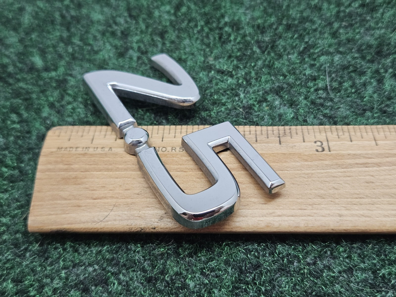 NISSAN 2.5 REAR CHROME EMBLEM LOGO SYMBOL BADGE OEM 7S7