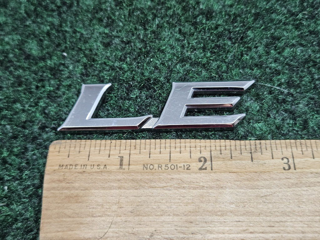 Genuine Toyota Camry  "LE" rear emblem Camry USED 75443-06180 fits 2007-2011 7S7