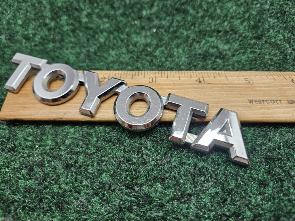 Genuine OEM Toyota 75442-16530 "TOYOTA" Trunk Emblem Badge Nameplate GL2