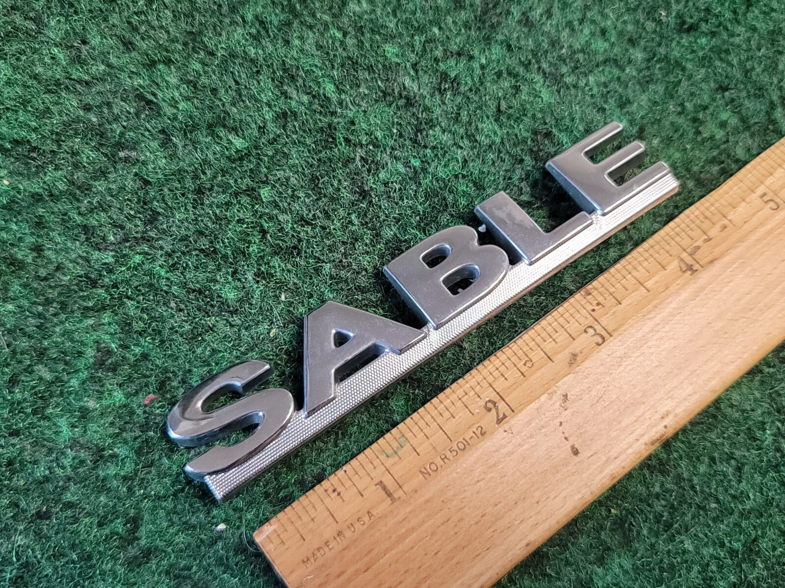00 01 02 03 MERCURY SABLE REAR GATE LID EMBLEM BADGE SYMBOL LOGO OEM 1M6