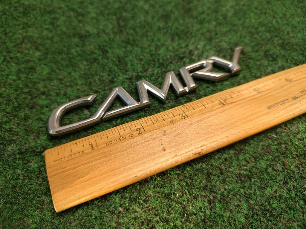 2002-2006 TOYOTA CAMRY CHROME REAR EMBLEM LOGO BADGE NAME PLATE OEM 3S8