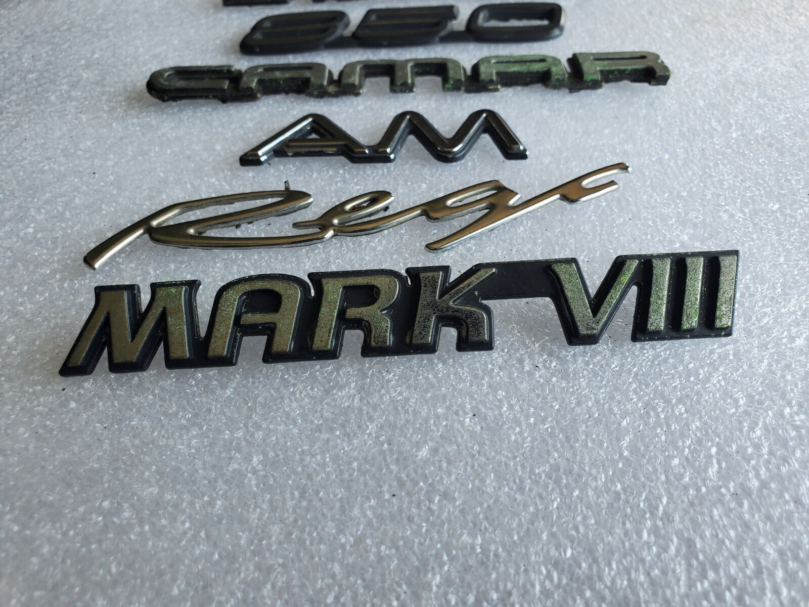 Misc Lot Of Emblwms Vintage Letters Logo OEM Mark VIII VOLVO Regal Camaro VNTG