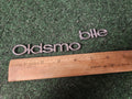 Oldsmobile OEM Chrome Emblem Badge Logo Nameplate Name Plate 6.25" Cracked 3M5